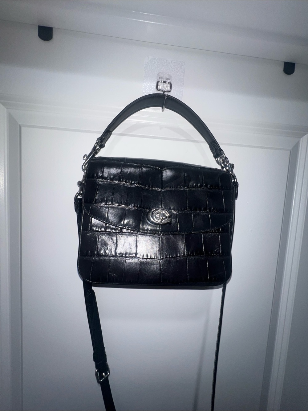 Coach Cassie Crossbody 19 in black crocodile-embossed leather